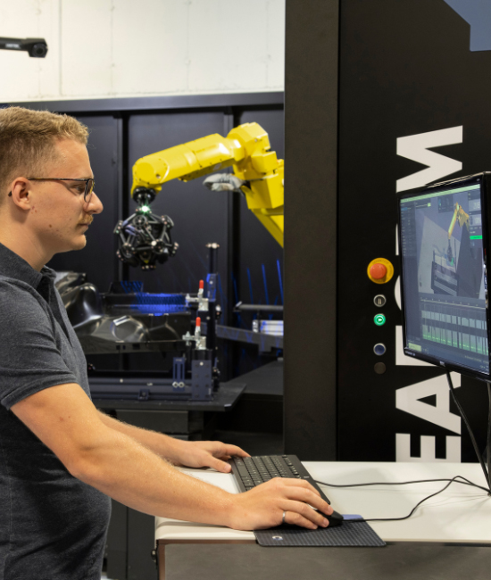 Man using CUBE-R to scan part